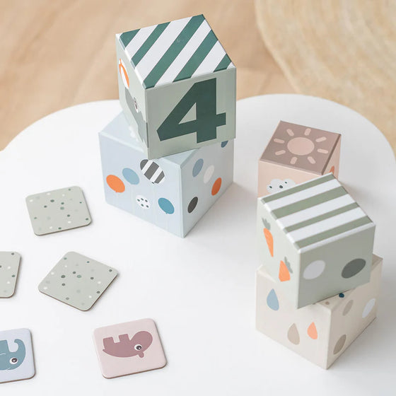 done by deer stacking cubes 5 pieces